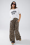 Calças com estampado leopardo cordão e bolsos