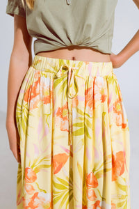 saia maxi amarela com estampado tropical