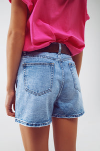 Shorts jeans com estrelas laminadas em lavagem clara